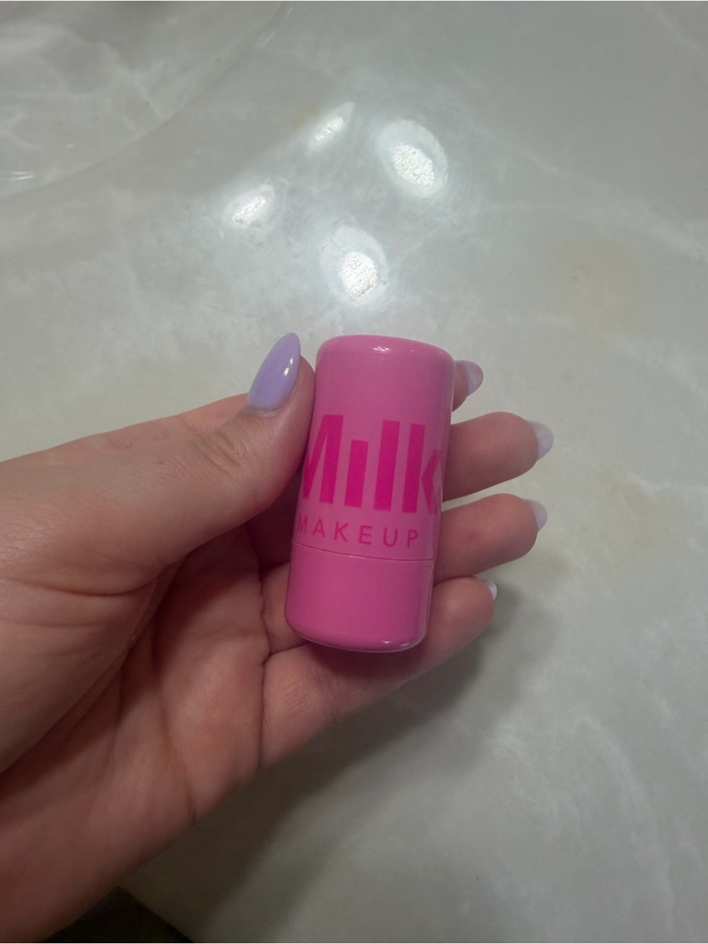 Milk Makeup Cream Highlighter Stick in Bright Pink
